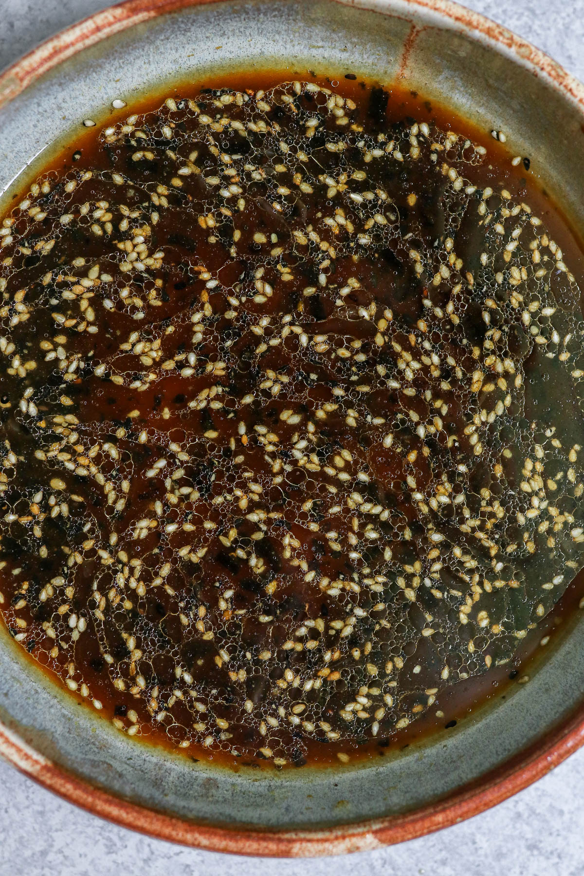 marinade in a blue bowl.