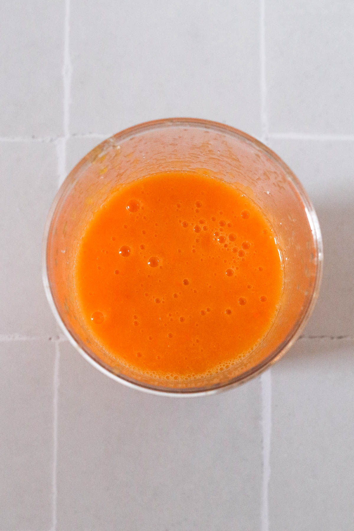 blended hot sauce in a cup.