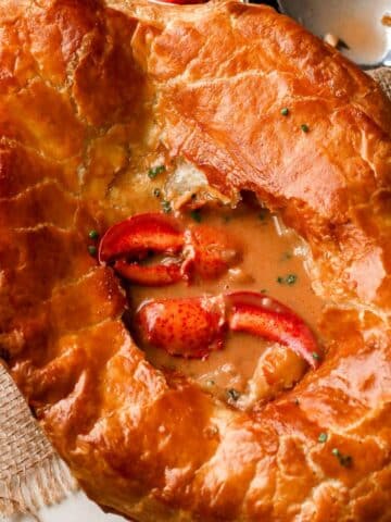 lobster pot pie with claw meat exposed.