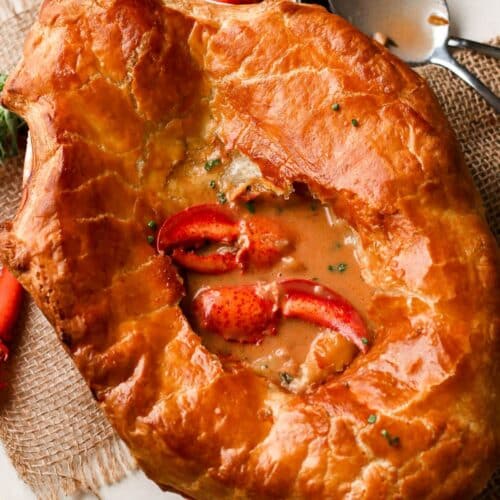 lobster pot pie with claw meat exposed.