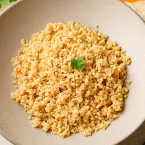 millet in a bowl with parsley.