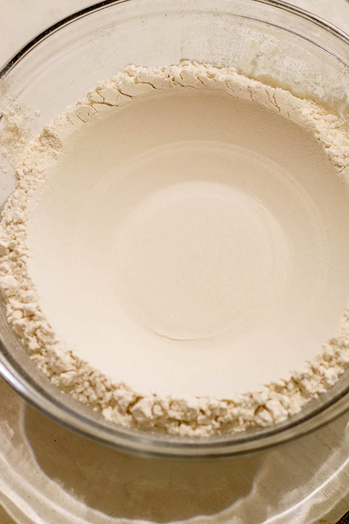 flour well in a bowl.
