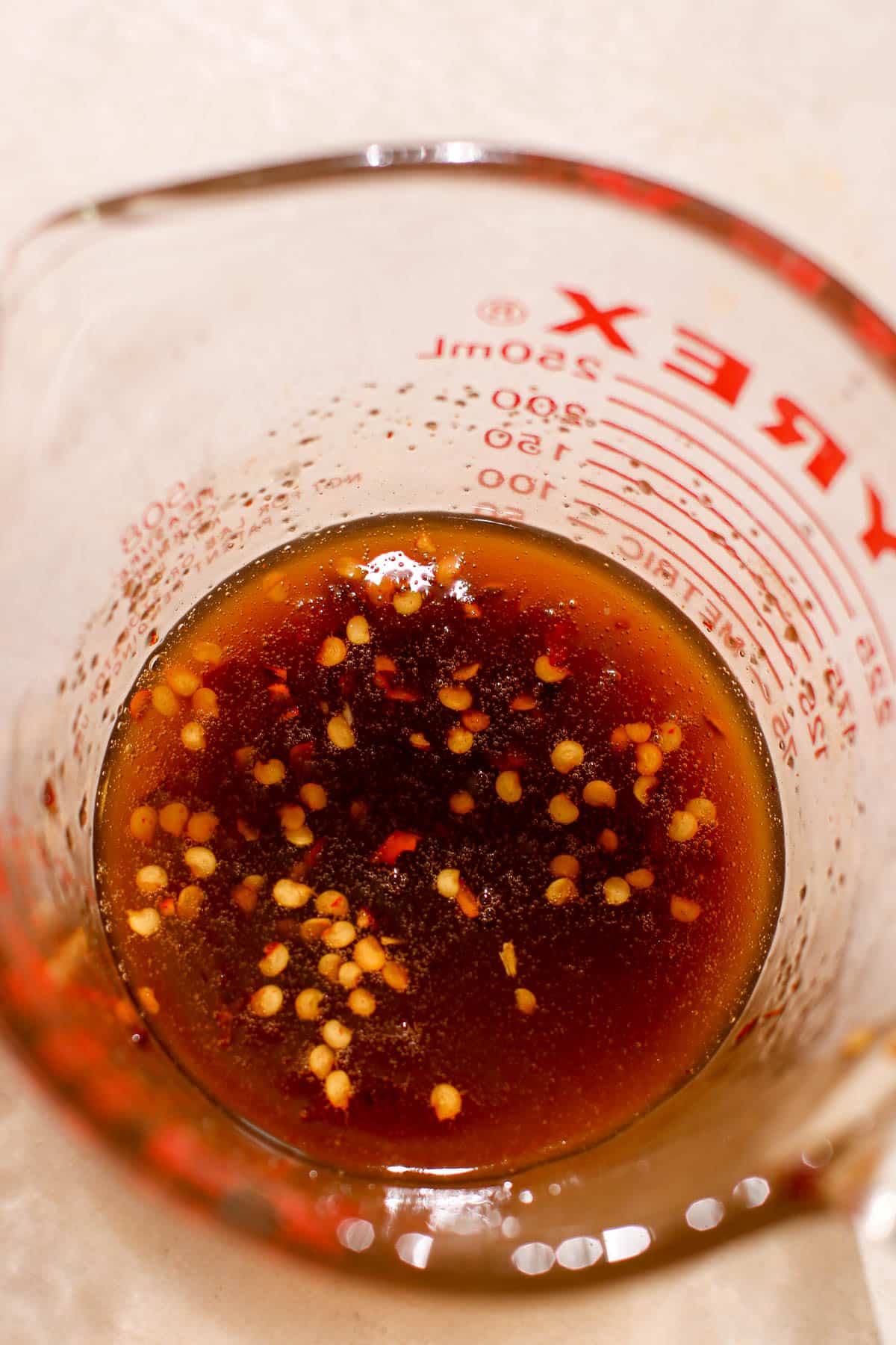 melted glaze in measuring cup.