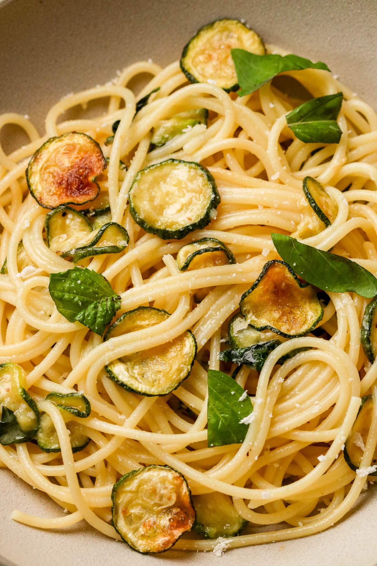 zucchini with pasta in a bowl.
