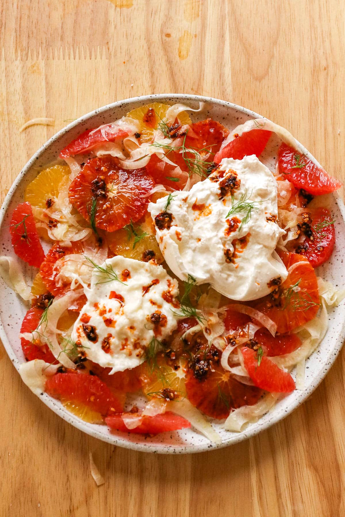 citrus fennel salad on a white plate